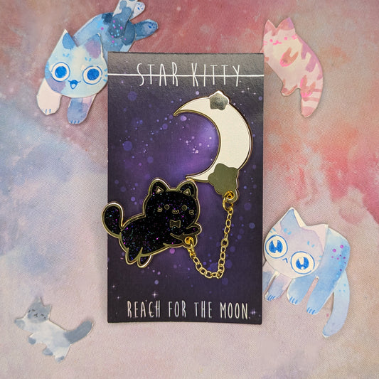 Star Kitty enamel pin and Moon with stars on decorative backing card 